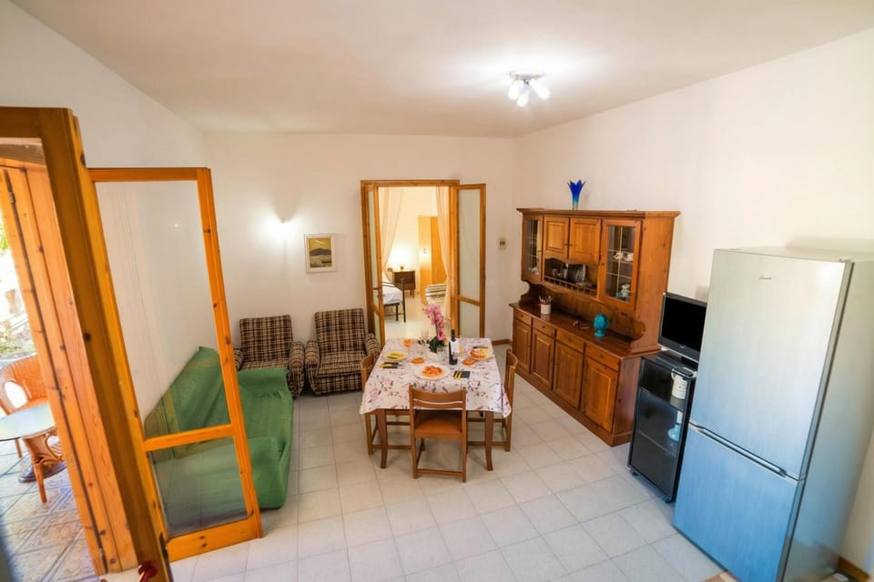 Standard Apartment, 3 Bedrooms, 2 Bathrooms (Villetta Fresca With Garden Near The) | Living area | Flat-screen TV