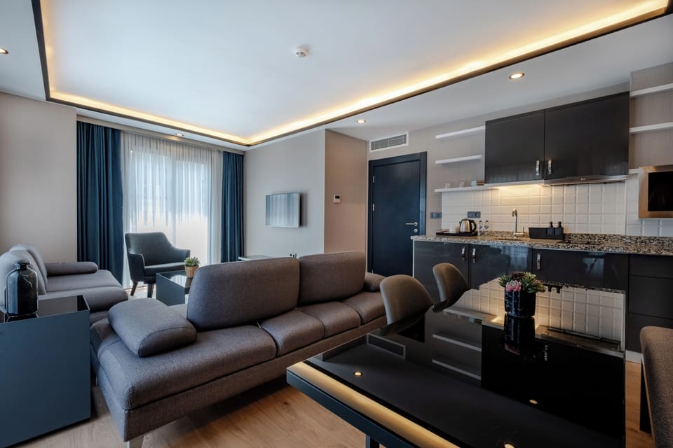 Two-Bedroom Suite | Living area | 42-inch Smart TV with satellite channels, Netflix, streaming services