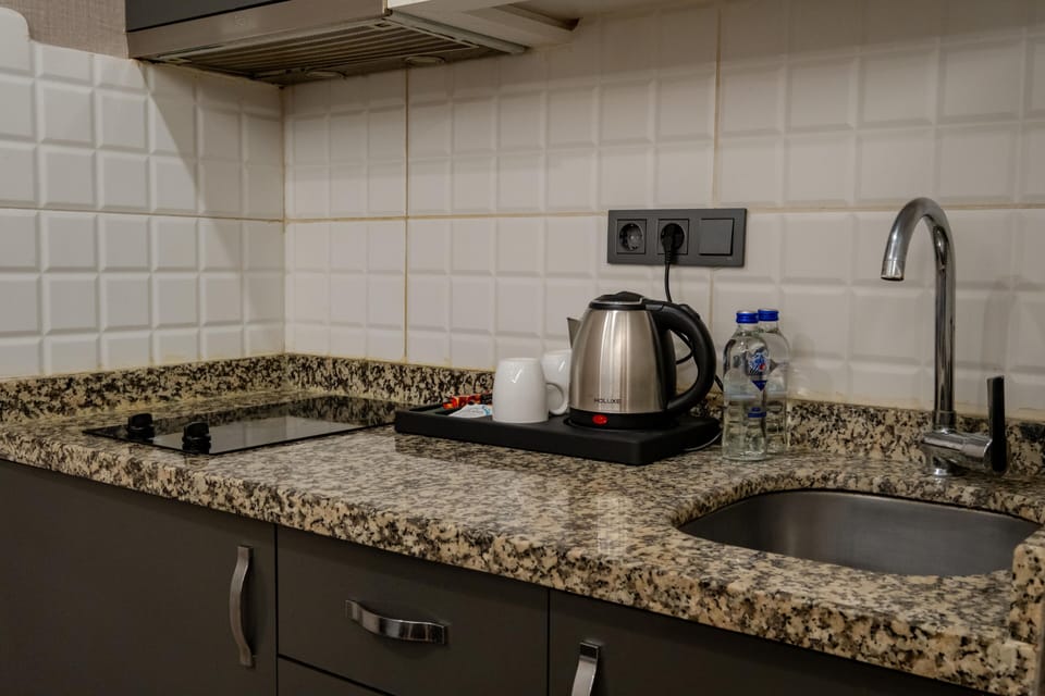 One-Bedroom Suite (Basement Floor) | In-room safe, iron/ironing board, free WiFi, bed sheets