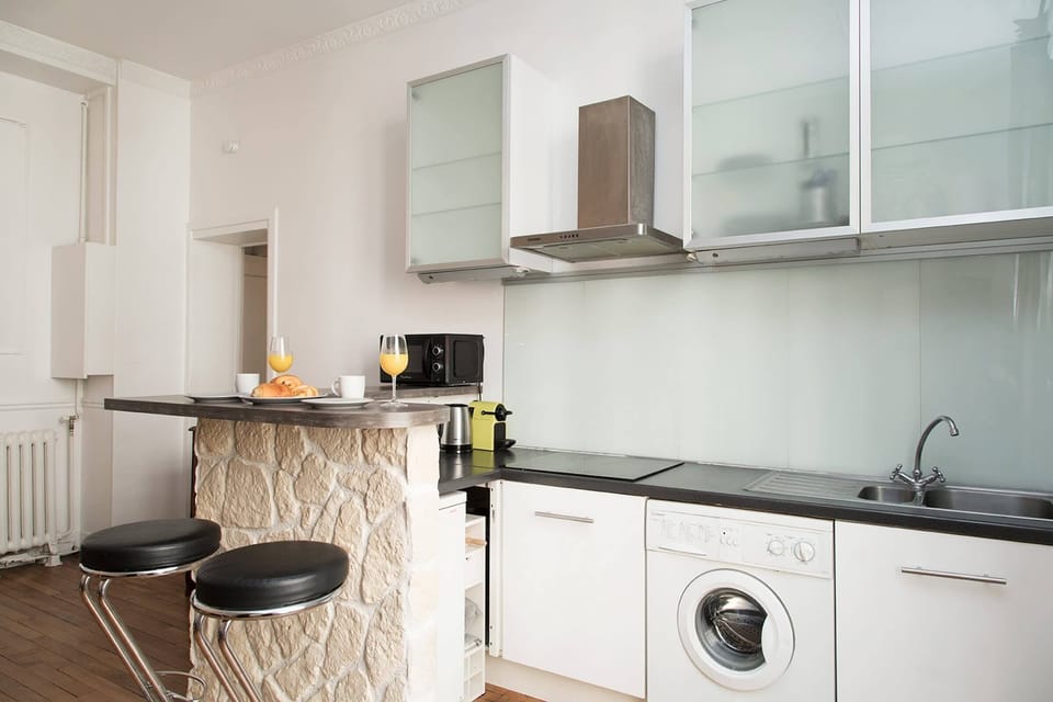 The kitchen is fully equipped to prepare a simple meal
