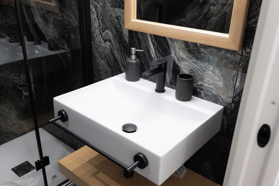 Design Room | Bathroom | Shower, rainfall showerhead, hair dryer, bidet