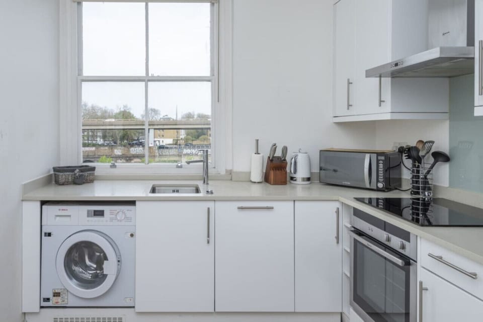 Fully-equipped kitchen ready for your chef-like skills. It's inside on Room 1.