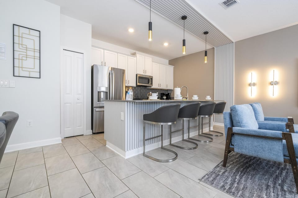 Living Room + Fully Equipped Kitchen