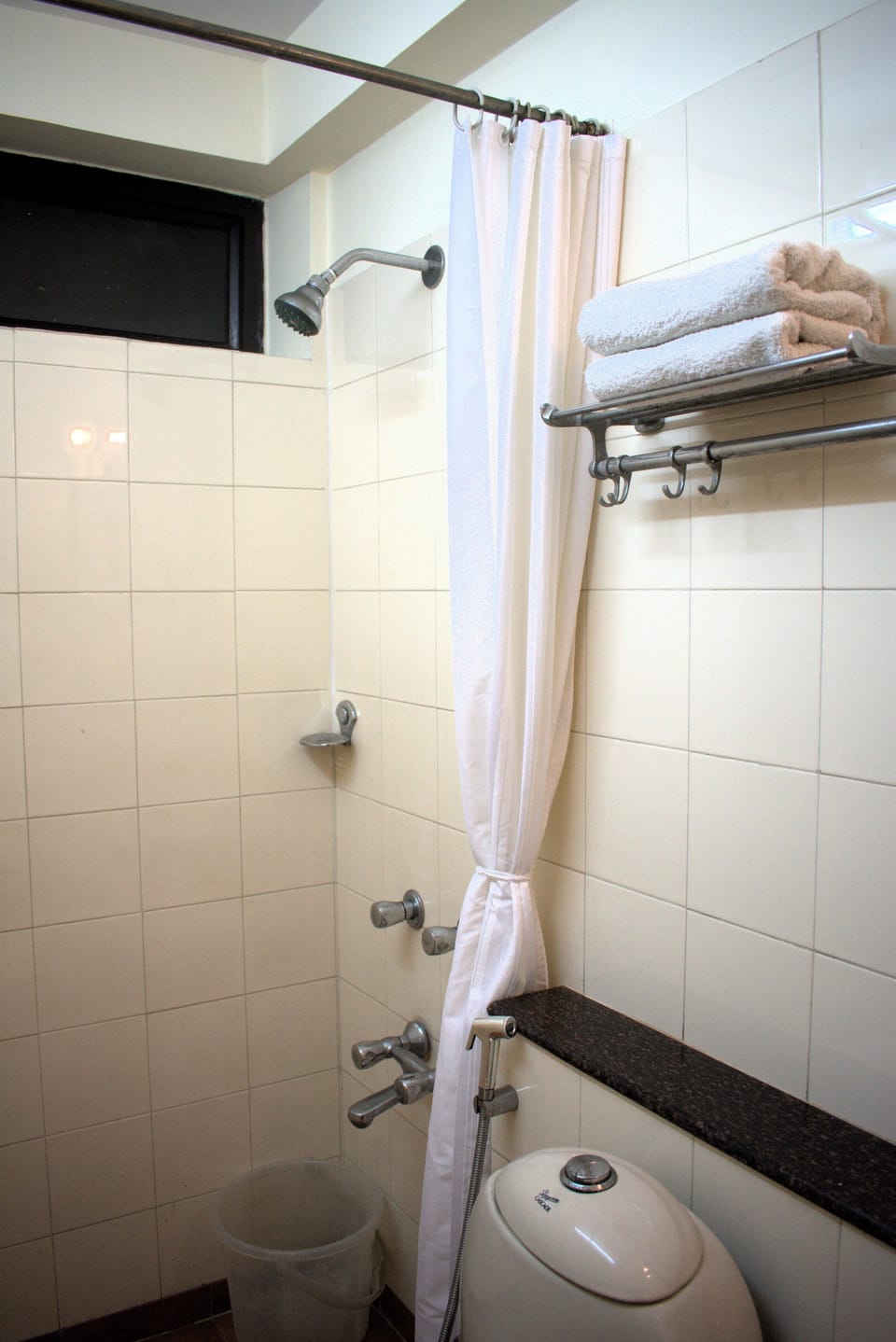 Shower, hydromassage showerhead, eco-friendly toiletries, hair dryer