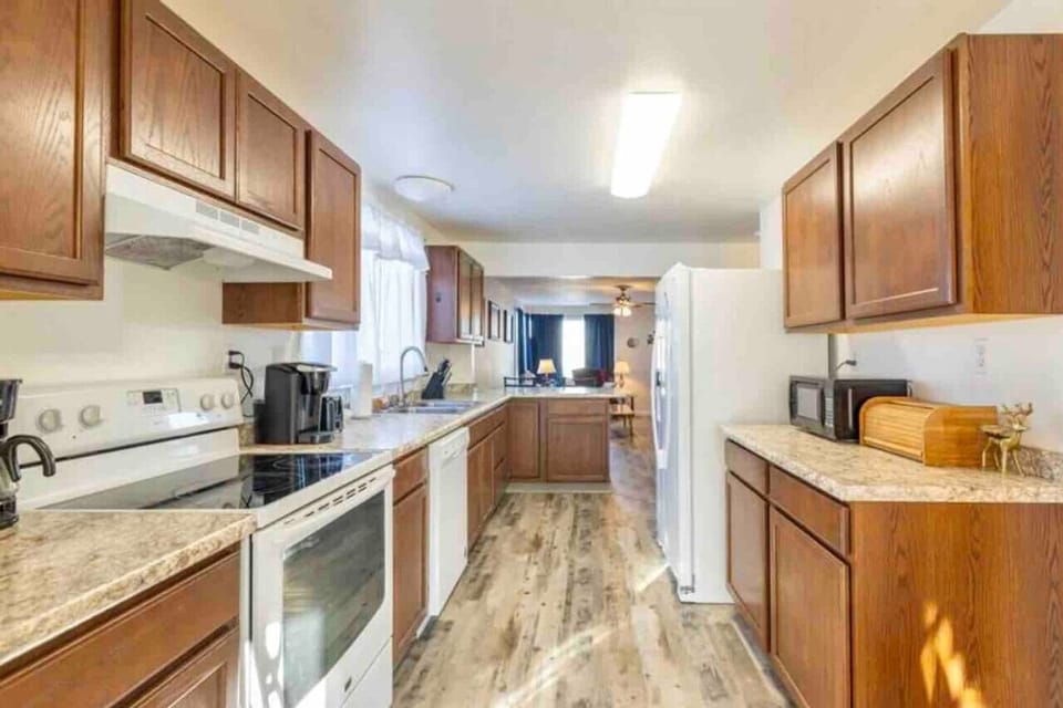 Kitchen views from the mud room, with everything you need to cook, bake, and enjoy during your stay.