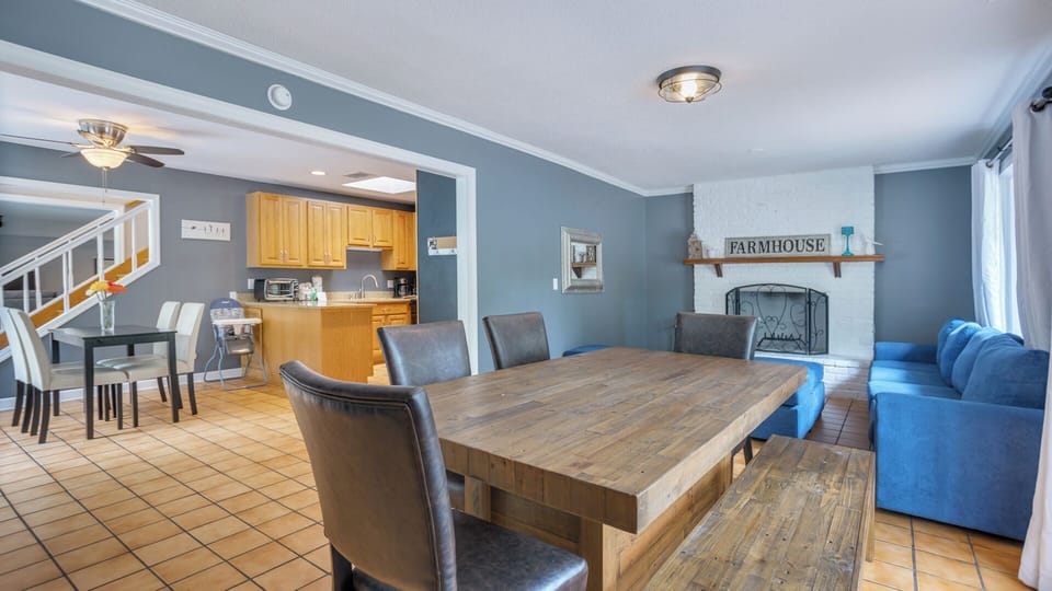 At the heart of the home, this expansive dining and living area is designed for bringing everyone together.