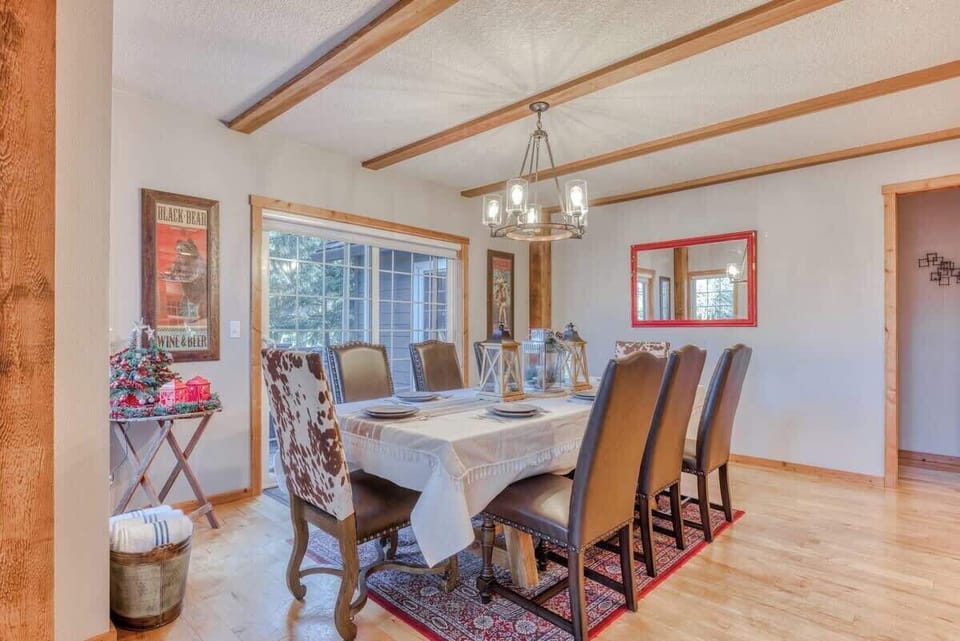 Dine and socialize at the large dining table, easily accommodating eight guests.
