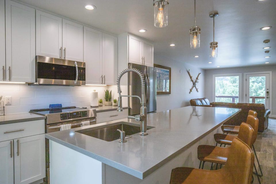 A sleek kitchen offers everything the chef in your group needs to prepare delicious meals.