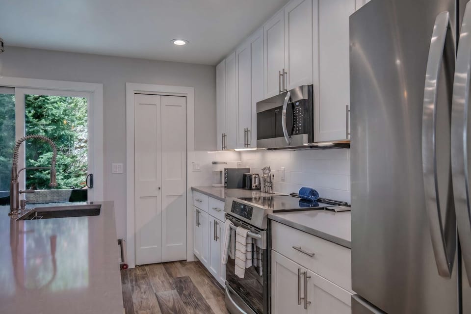 Spacious countertops and a pantry offer ample space to store your food items during your visit.