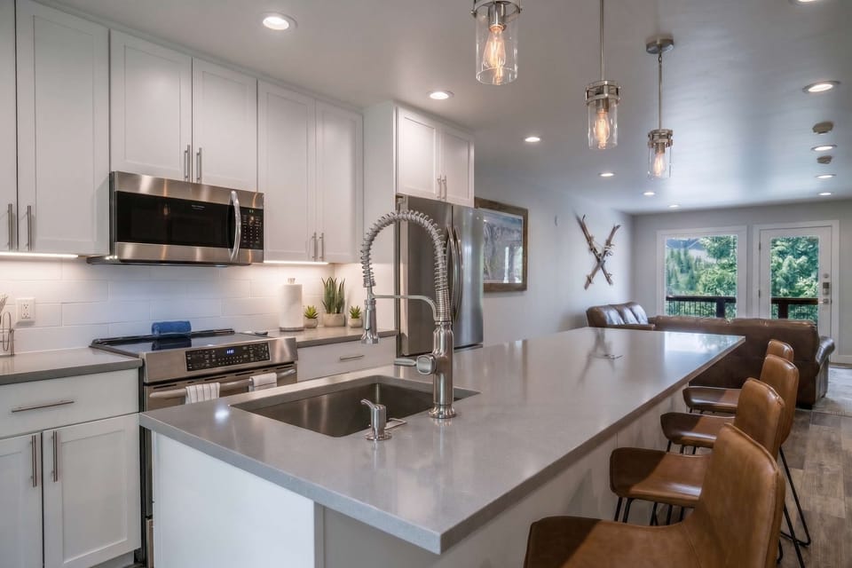 A sleek kitchen offers everything the chef in your group needs to prepare delicious meals.