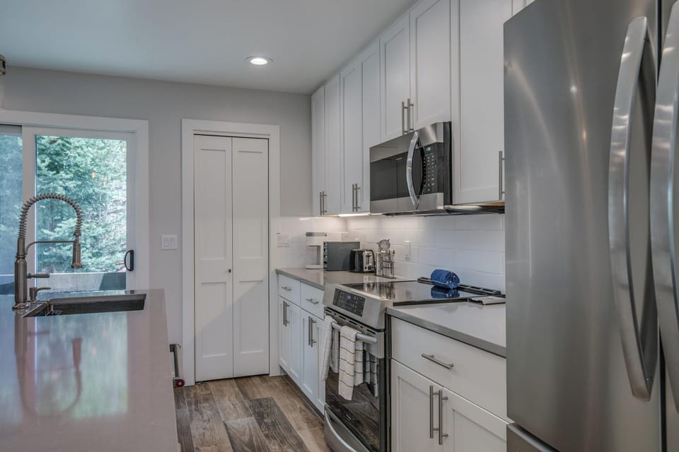 Spacious countertops and a pantry offer ample space to store your food items during your visit.