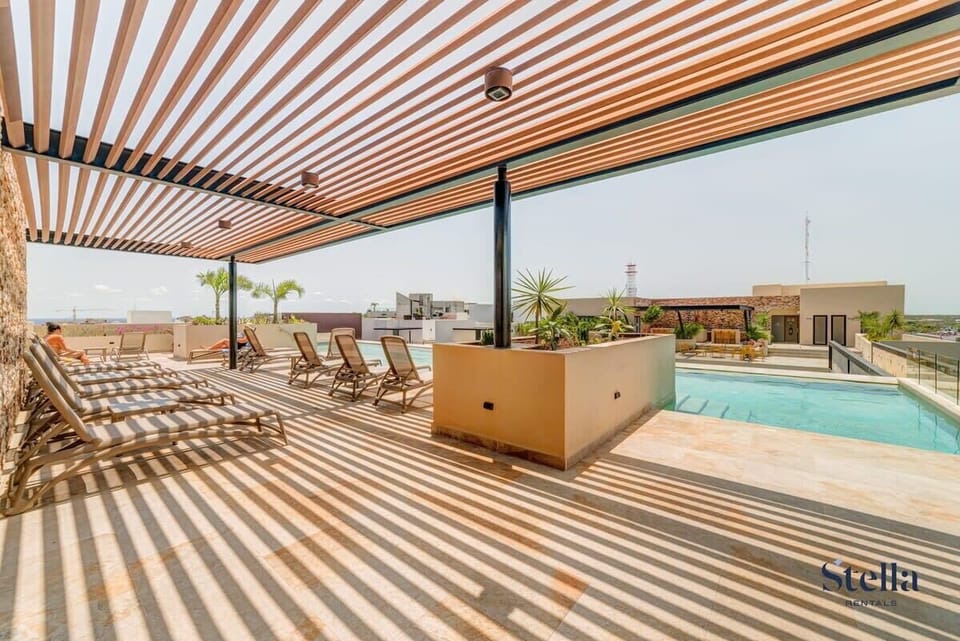 Here you can relax on a shaded lounger next to the pool