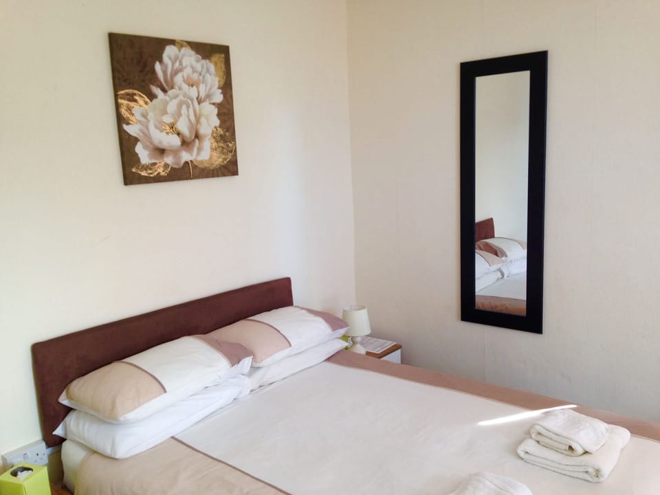 Family Room | Hypo-allergenic bedding, in-room safe, individually decorated, desk