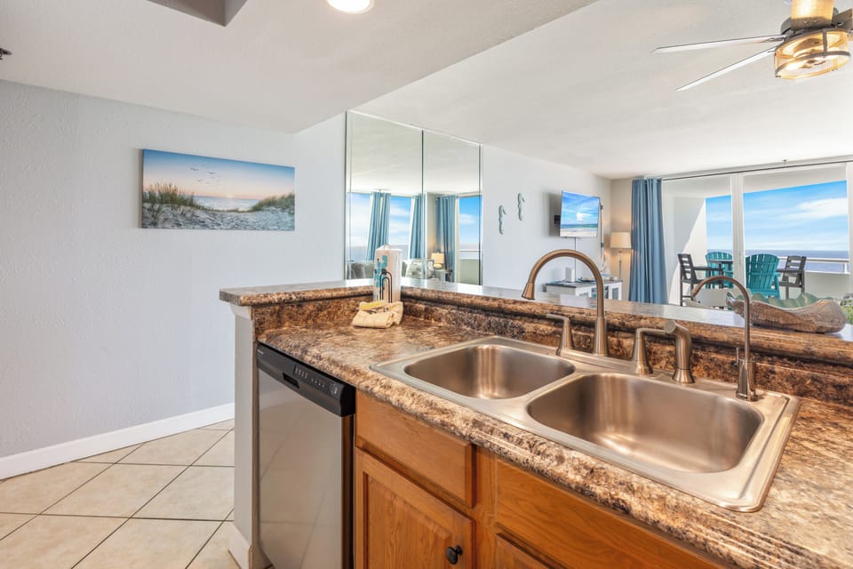 Perdido Sun Resort 1006 by PKRM - Modern kitchen is fully equipped in case you want to grab some extra fresh shrimp at the local seafood market!