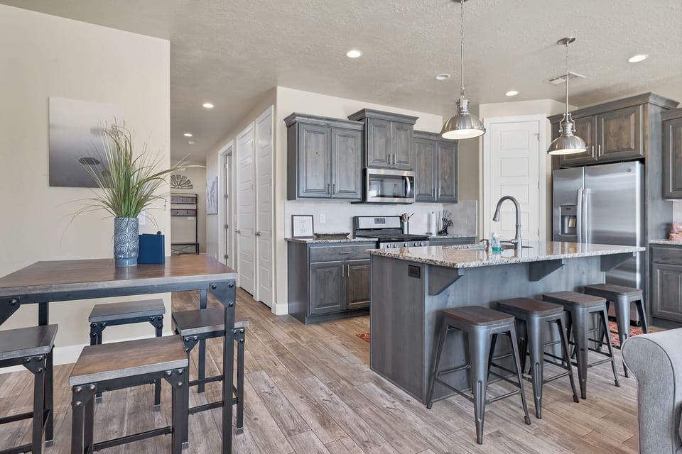 Kitchen - The Kitchen Island comfortably seats 4 adults and creates a great space for serving and preparing meals.