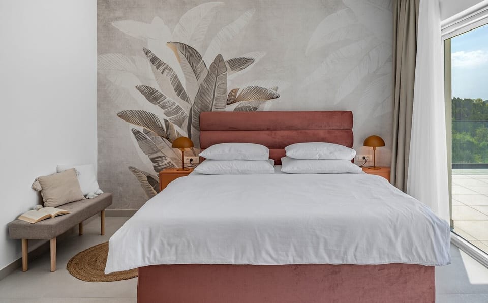 The Bedroom NO3 with a king size bed, A/C, a TV, an en-suite bathroom with a shower, and a terrace overlooking the pool and natural surroundings
