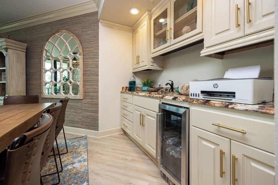 Grab a chilled drink from the fridge or create your favorite cocktail at the wet bar