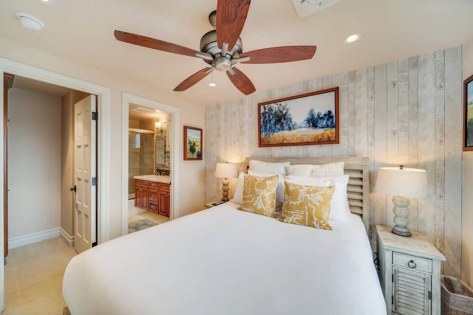Stylish main bedroom with a plush queen bed & an ensuite bathroom