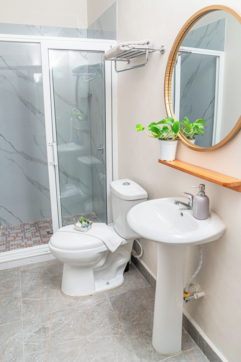 Shower, rainfall showerhead, designer toiletries, towels