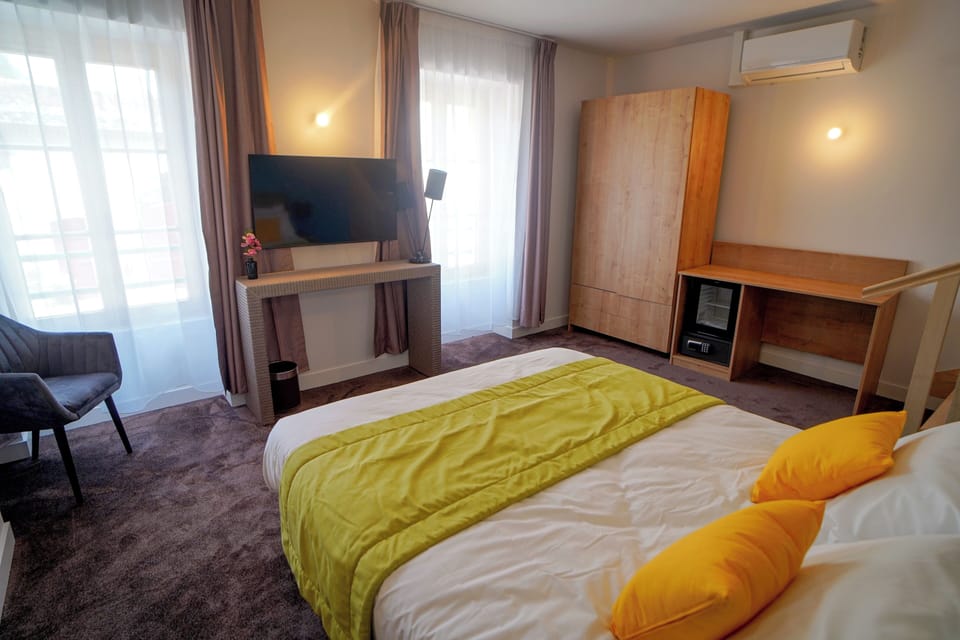 Comfort Double Room, City View | In-room safe, desk, soundproofing, iron/ironing board