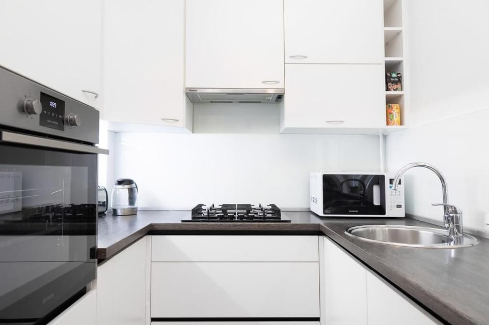 Feel like cooking? We do! Modern cooking ambiance for your convenience :)