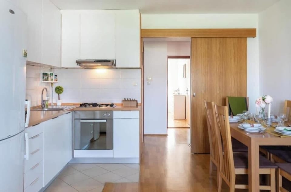 The bright kitchen and dining area