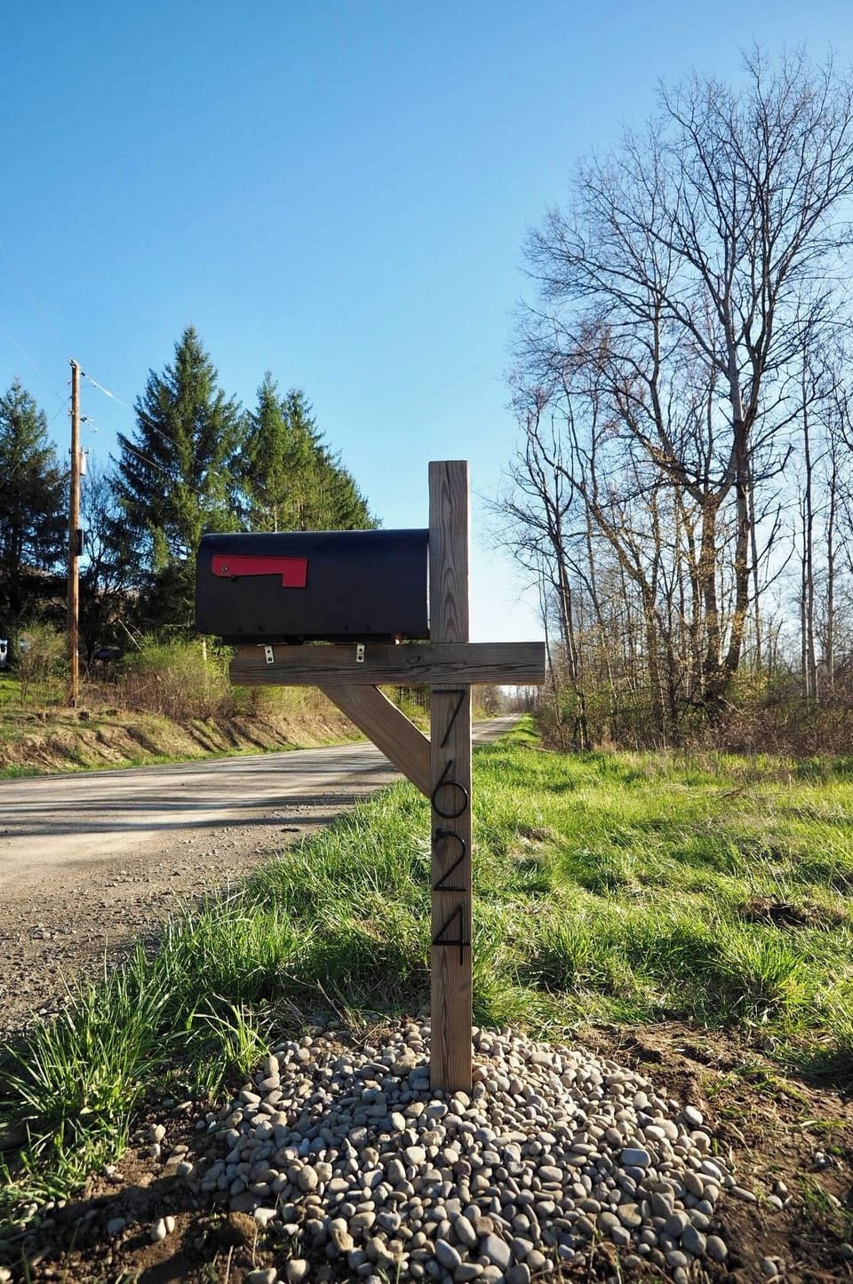 Mailbox which is across the street from the driveway entrance 