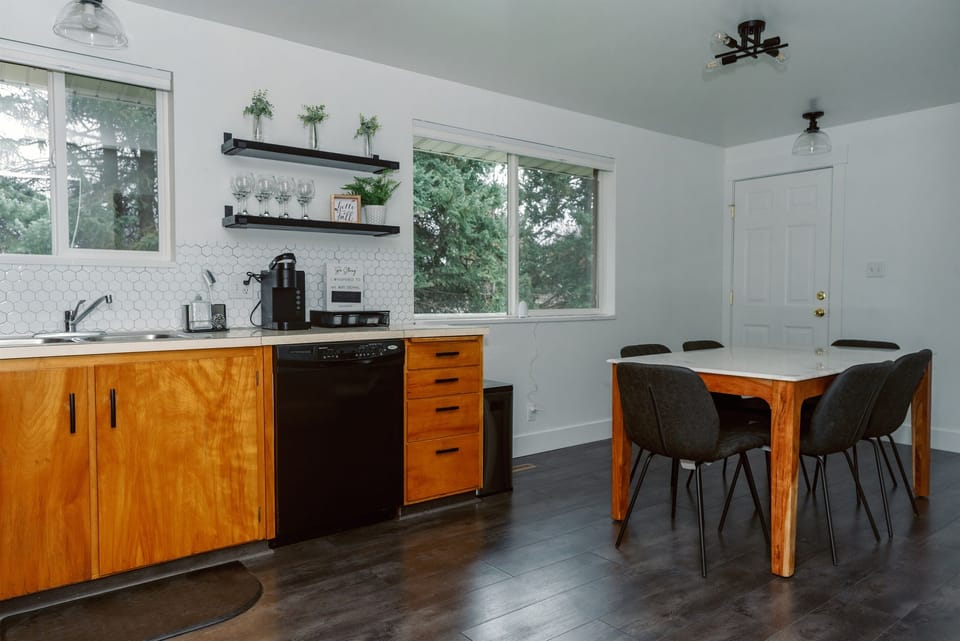 Dining room attached to kitchen. Table seats six.