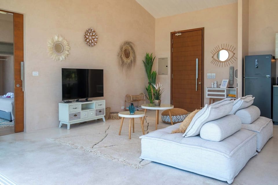 Exclusive Villa, Patio, Ocean View | Living area | Flat-screen TV