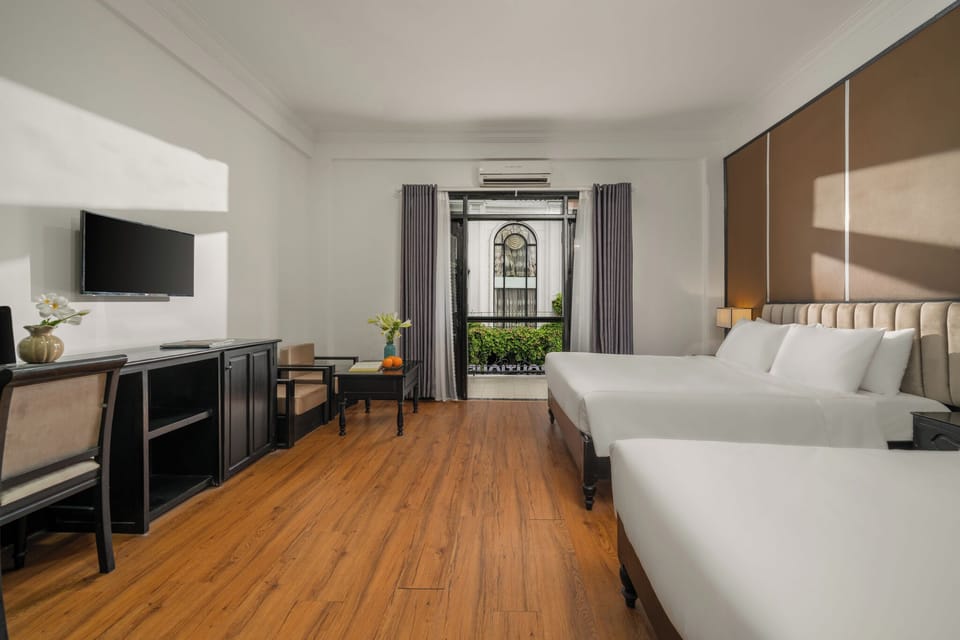 Premium bedding, pillowtop beds, desk, blackout drapes
