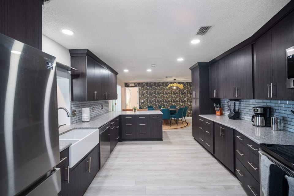 Fully stocked kitchen with stainless steel applicances