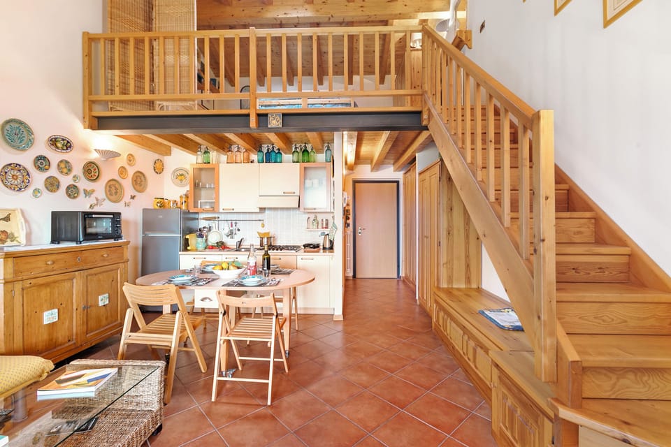 Standard Apartment, Multiple Bedrooms (Grotten Loft with lake view & pool) | Private kitchen | Fridge, microwave, stovetop, coffee/tea maker