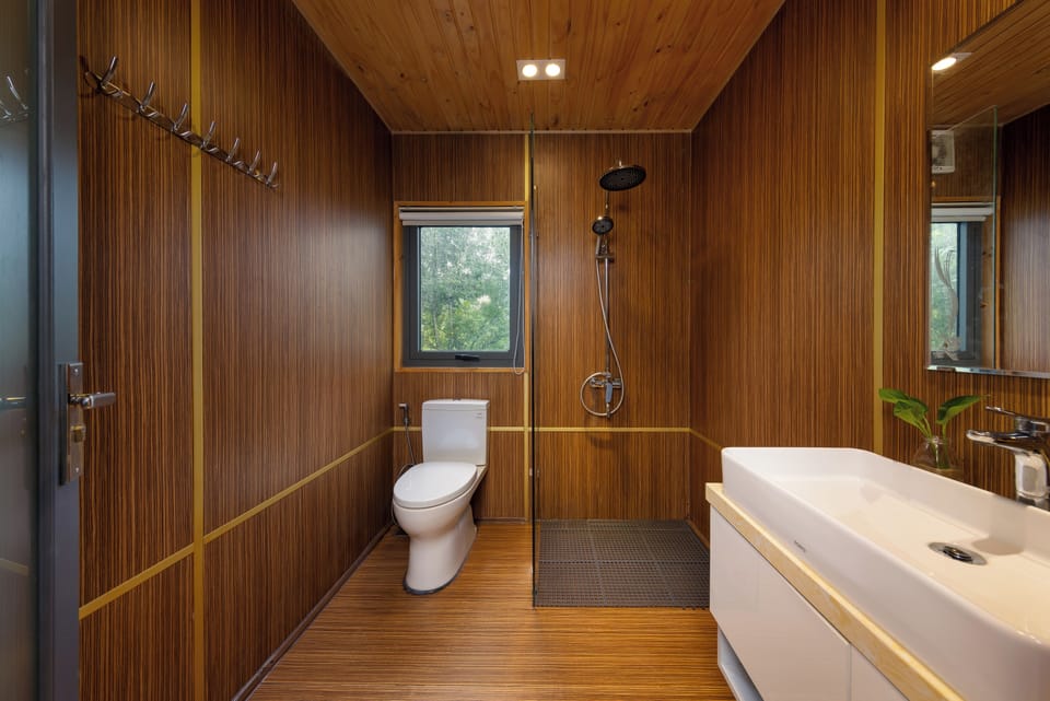 Deluxe Bungalow, Mountain View | Bathroom | Hydromassage showerhead, designer toiletries, hair dryer, bathrobes