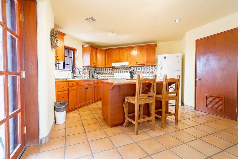 Full kitchen with stove, fridge, and counter space at Casa Richy in El Dorado Ranch San Felipe BC MX — perfect for home cooking.