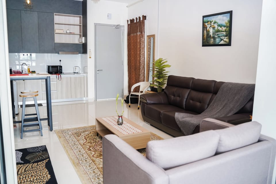 Comfort Studio | Living area | 32-inch Smart TV with cable channels, Netflix, streaming services