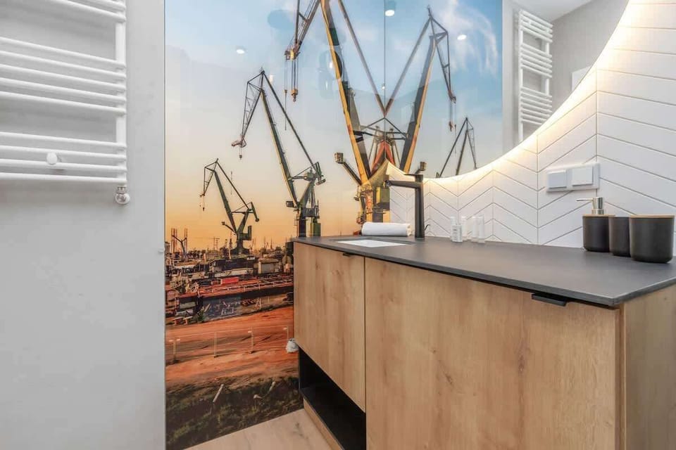 The bathroom offers a clean and functional space for your stay. 