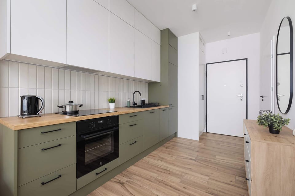 The fully equipped kitchenette includes everything you need for a home-cooked meal.