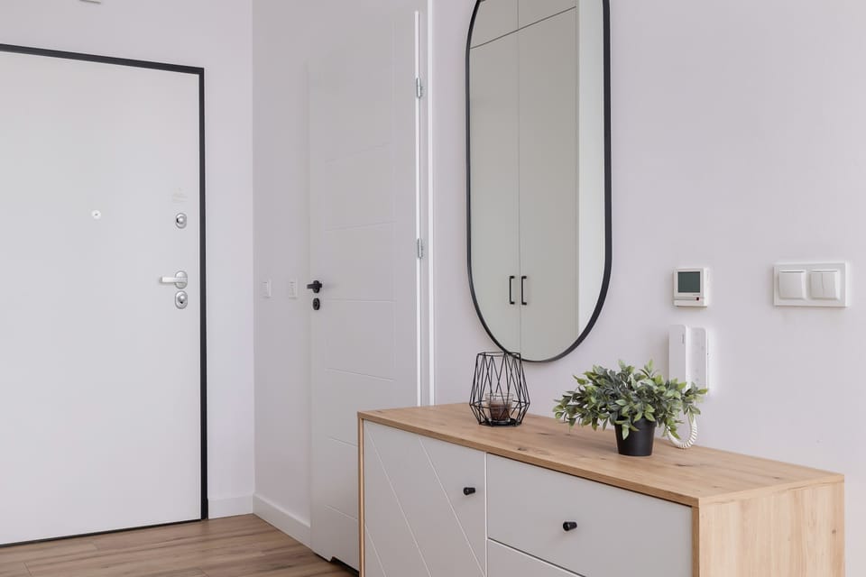 The living room's sleek design is both functional and aesthetically pleasing.