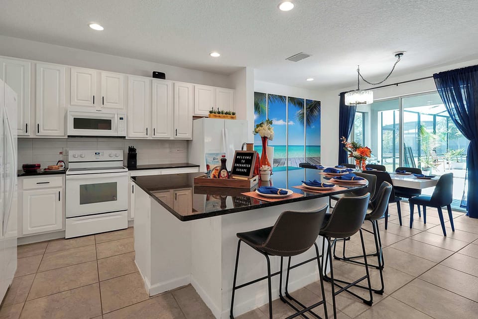 Cook and entertain in our sleek, fully equipped kitchen with a spacious island and bar seating
