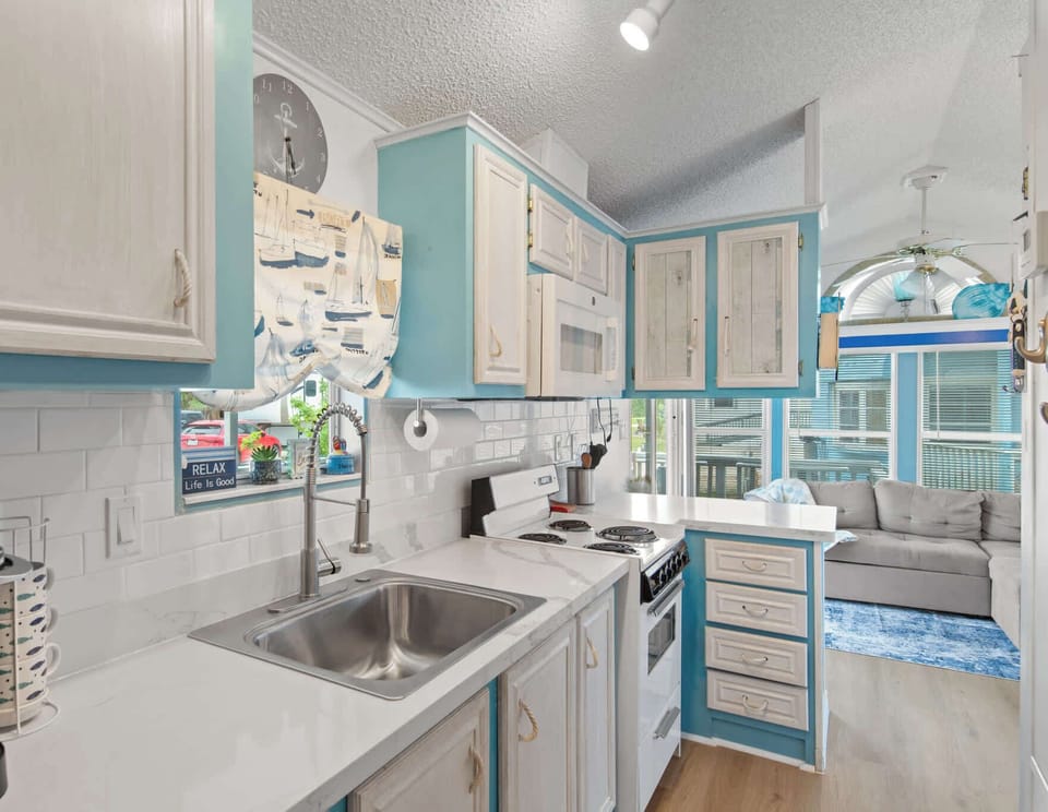 The open kitchen flows right into the living space