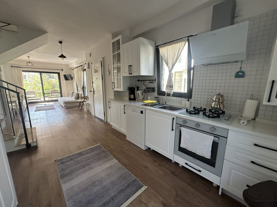 Family Villa, 2 Bedrooms, Kitchen, Garden Area | Private kitchen | Full-size fridge, oven, stovetop, dishwasher