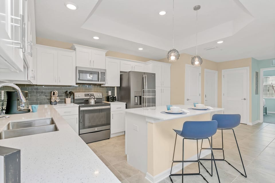 - Sublime and fully equipped kitchen of the condo in Kissimmee - Sufficient space to work according to your ease - Plenty of storage space - Stainless steel appliances with other accessories available - High chairs available at the breakfast counter