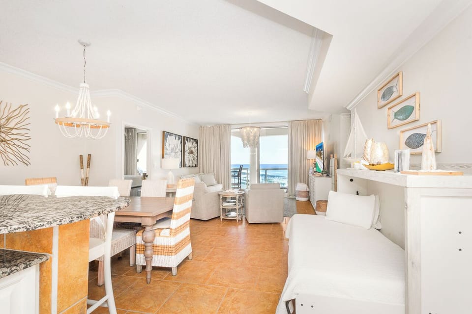 Unwind in your bright oceanfront retreat where coastal elegance meets comfort—watch waves from your living room.