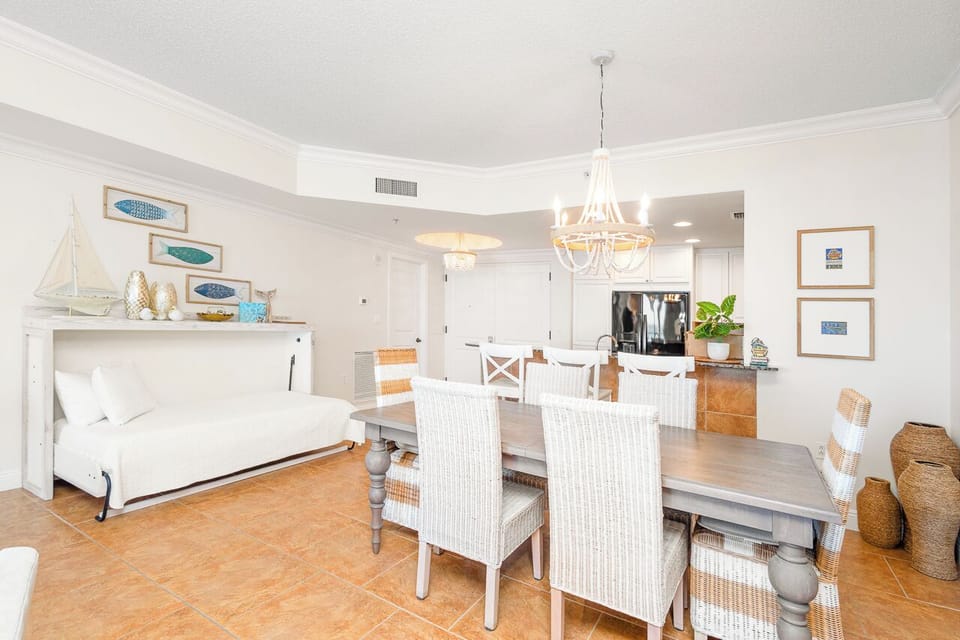 Gather around your elegant dining table where coastal charm meets comfort, perfect for memorable meals with loved ones.