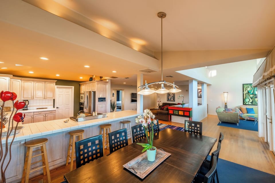 The dining area offers seating for10, and an additional bar-stool seating for 4 at the kitchen.	
