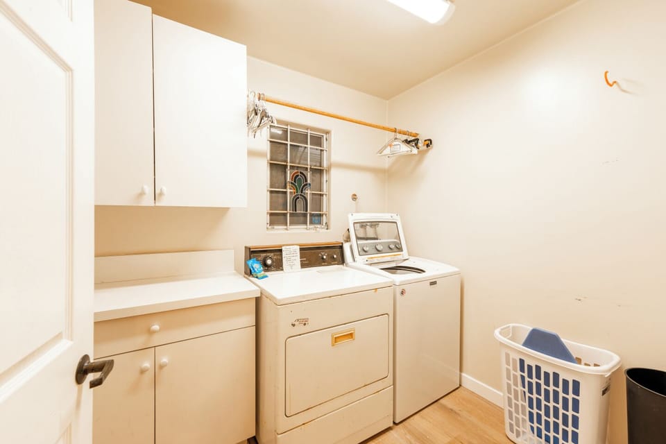 Laundry room with the washer and dryer. 