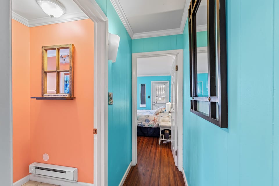 The Hall will lead you to the Full Bath and Bedroom.