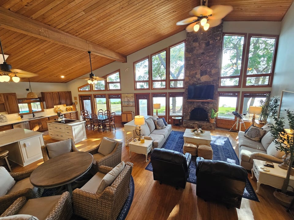 Comfortable seating, recliners, sofa. Game table with kitchen dining