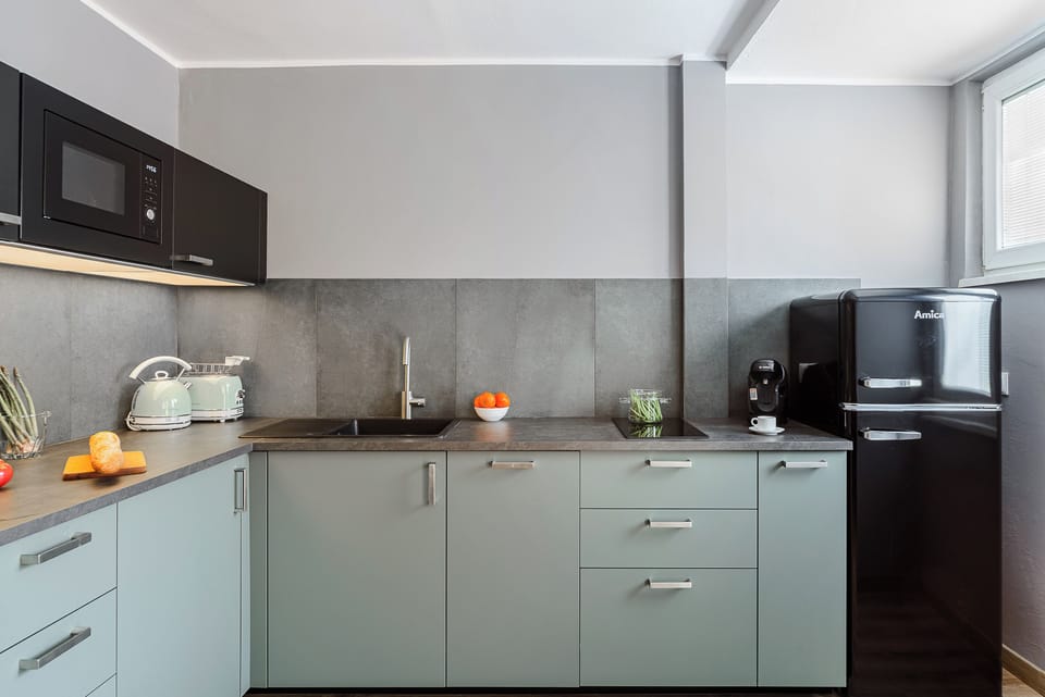 Apartment | Private kitchenette | Fridge, microwave, stovetop, dishwasher