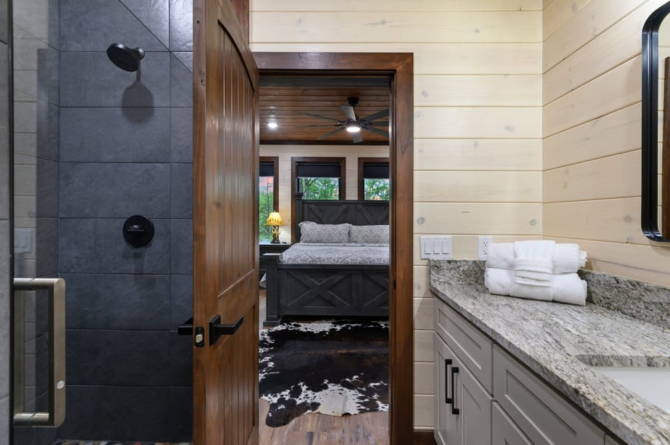A peek into one of the two king bedrooms from the full bathroom.